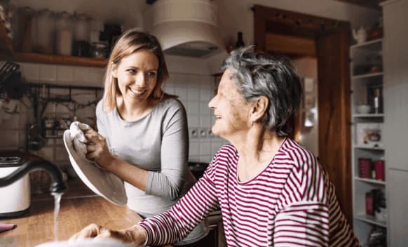 Personal care support worker helping NDIS participant in Liverpool
